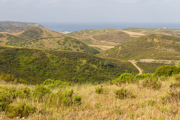 Fototapeta na wymiar Mountains cover by vegetation in Carrapateira