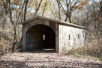Historic old American wooden bridge over a creek