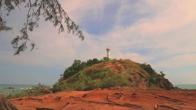 light house landmark of Lanta island.lighthouse is on Tanod cap the end way of Lanta Yai island build on the hill. on the beach around light house full of beautiful round rock.and have many monkey