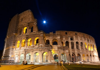 Fototapeta premium Colosseum night view (full moon). Rome,Italy.