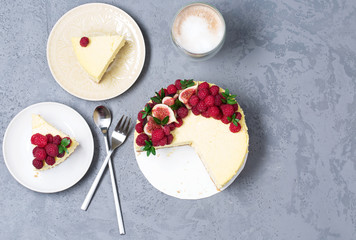 Cheesecake with raspberries and figs on a gray background, raspberry, berries, cake, horizontal, soft focus, sweets

