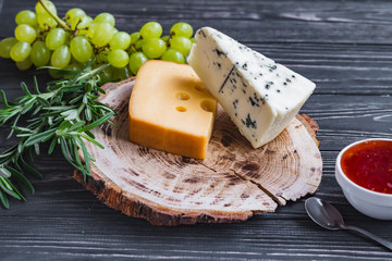 cheeses on wood are chopped deliciously and nutritionally
