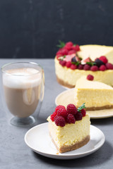 Cheesecake with raspberries and figs on a gray background, raspberry, berries, cake, vertical, selective focus, sweets
