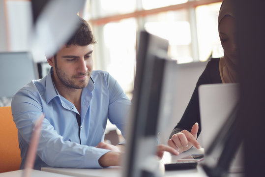 Freelance programmer working in startup office