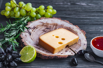 cheeses on wood are chopped deliciously and nutritionally