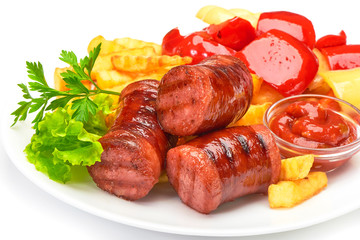 grilled sausages with potatoes fries and sweet bulgarian peppers and red sauce ketchup