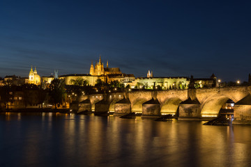 Prague Castle and Charles bridge at dusk