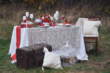autumnal floristic decor on the street wedding table setting