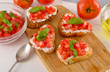 bruschetta with tomato on table