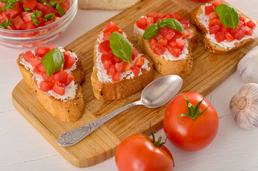 bruschetta with tomato on table