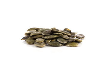 Pumpkin seeds on a white background