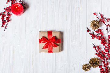 Christmas present on a wooden table background