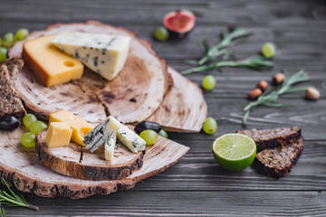 cheeses on wood are chopped deliciously and nutritionally