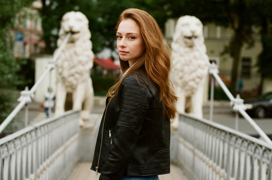 Young woman looking over her shoulder