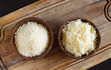 Bowls with grated parmesan cheese