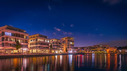 Dortmund Phönixsee bei Nacht mit bunter Beleuchtung © Marcus Retkowietz