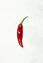 Red hot chili pepper in minimalistic style, top view