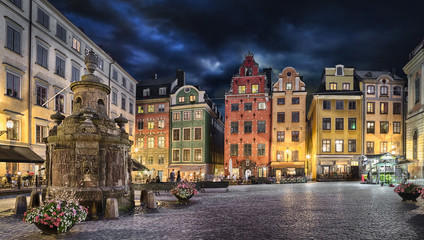 Stortorget square with colorful couses in the center of Old Town (Gamla Stan) of Stockholm, Sweden at dusk