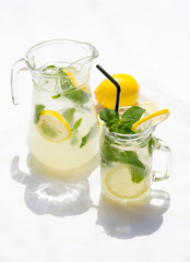 drink from mint with water and lemon in a jug