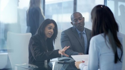  Corporate business management team in boardroom meeting in city office - Powered by Adobe