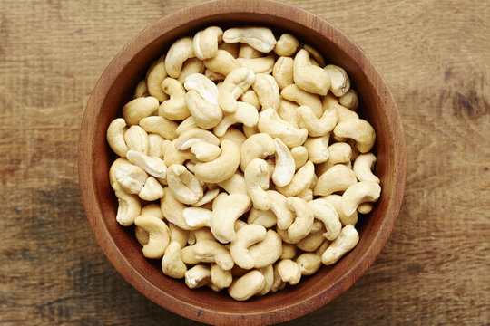 Cashew nuts in a wooden bowl