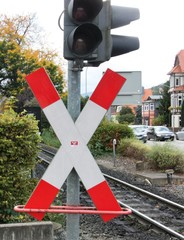 Train crossing in front of blue sky