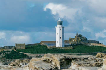 Fototapeta na wymiar Miniature looking lighthouse