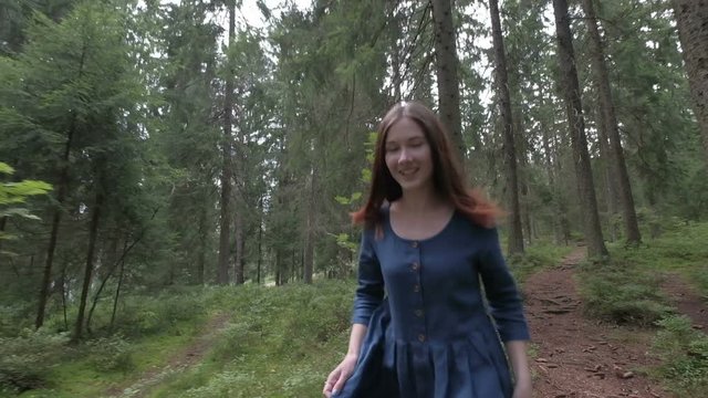 Pine forest,Beautiful woman in pine forest,beautiful girl walking in pine forest.