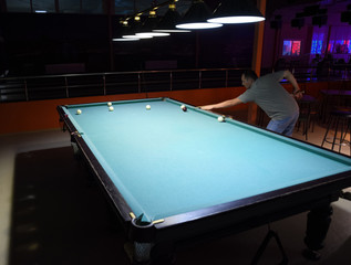 Russian billiards. Playing billiards in a nightclub.