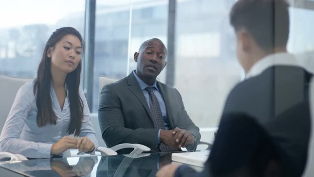  Corporate business team in a meeting in modern city office