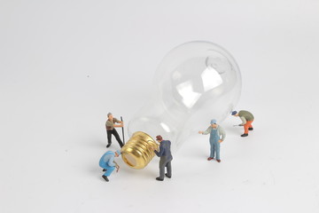 worker character as electrician with bulb