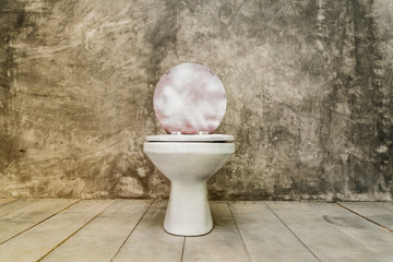 dirty old toilet bowl with concrete background