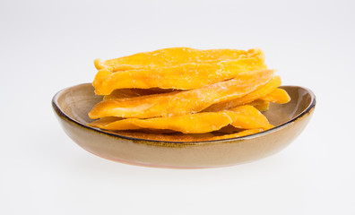 Dried Mango or Dried Mango slices on a background.