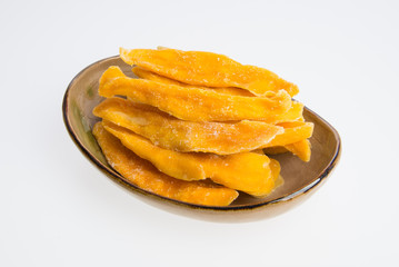 Dried Mango or Dried Mango slices on a background.