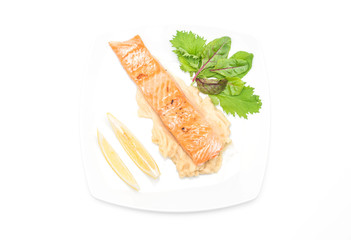 grilled salmon steak with mash potato and vegetable salad