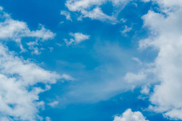 Naklejka na ściany i meble Photo of the sky with fluffy cumulus clouds