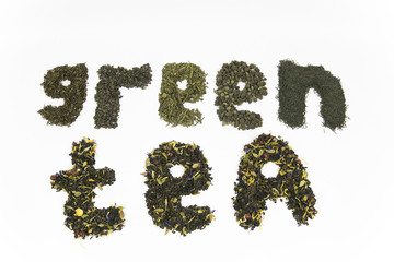 Green flavoured teas TEA - inscription from green flavored tea on a white background