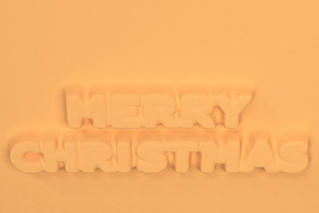 Orange Merry Christmas words bas-relief