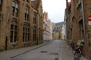 Fototapeta na wymiar Street along the medieval architecture building in Bruges Belgium