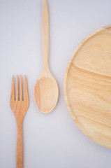 Wooden fork, spoon and plate