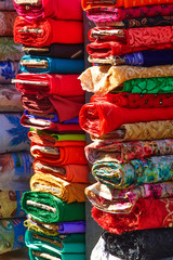 Fototapeta na wymiar Multicolored fabrics in the market of Nepal 