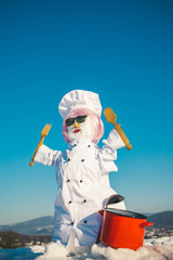 Christmas snowman in chef hat