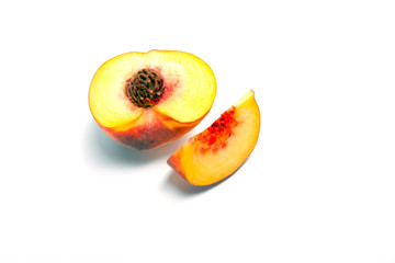 Ripe peach (nectarine)  isolated on white background