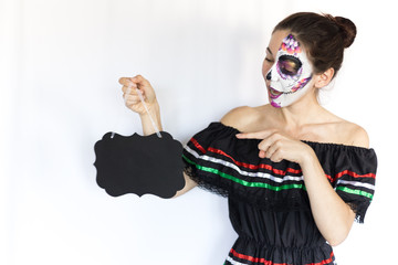 Brunette girl with Halloween make up hold banner, sign