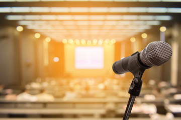 Microphone over the blurred business people forum Meeting Conference Training Learning Coaching Concept, Blurred background