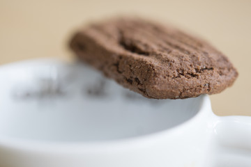 dried chocolate biscuits and coffee