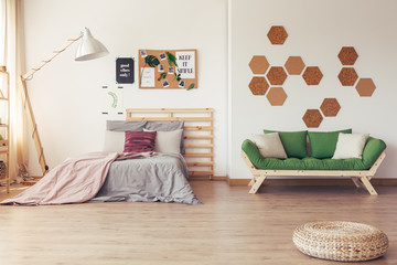 Multifunctional bedroom with cork board