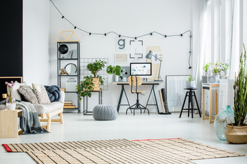 Bright home office with pouf
