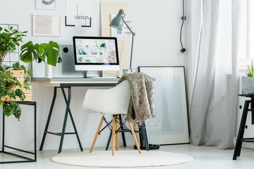 Scandinavian style workspace with plants