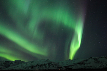 The Northern Lights (Aurora borealis) over Jokulsarlon in Iceland